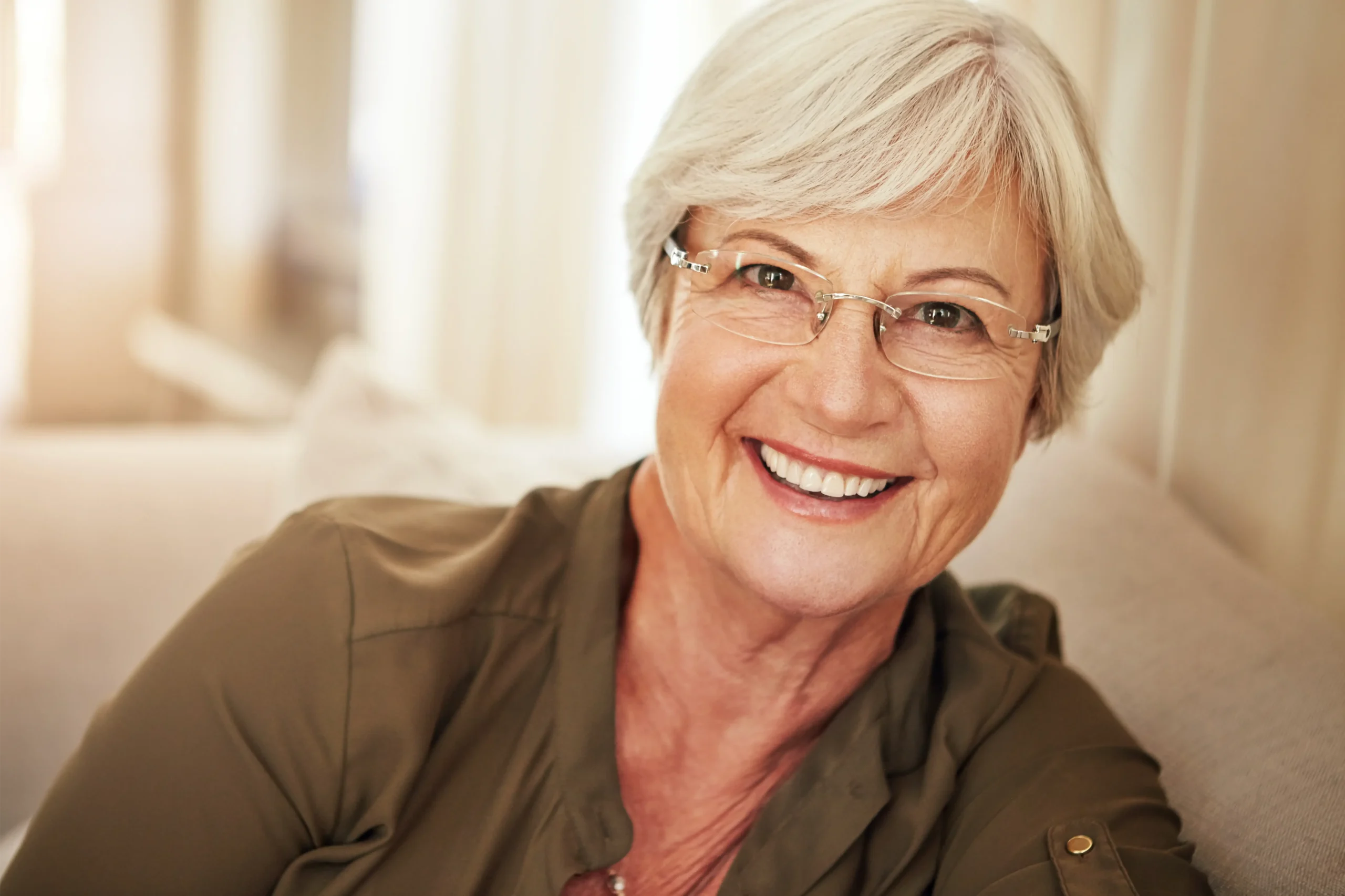 Smiling senior woman wearing glasses