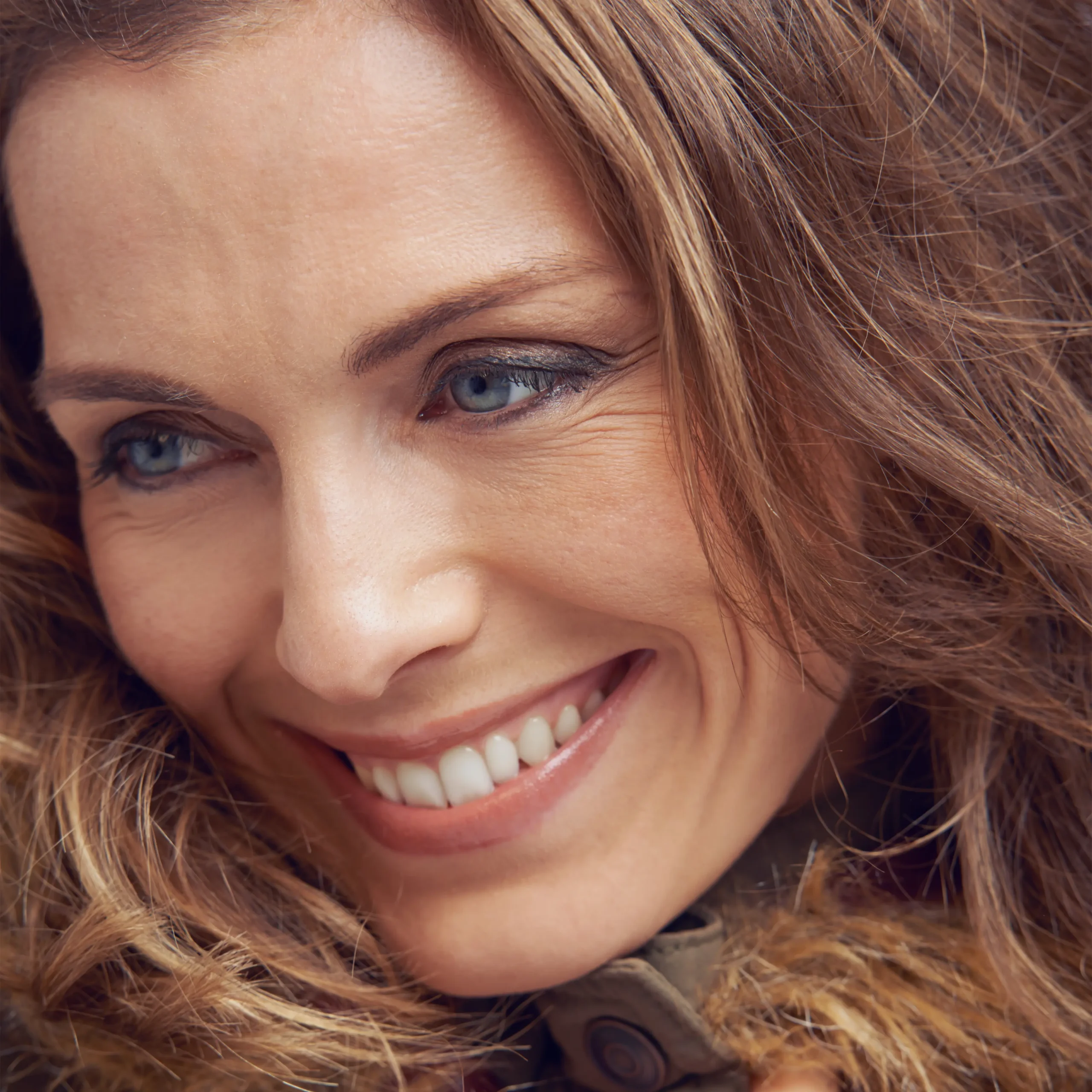 Close-up of a woman's warm smile
